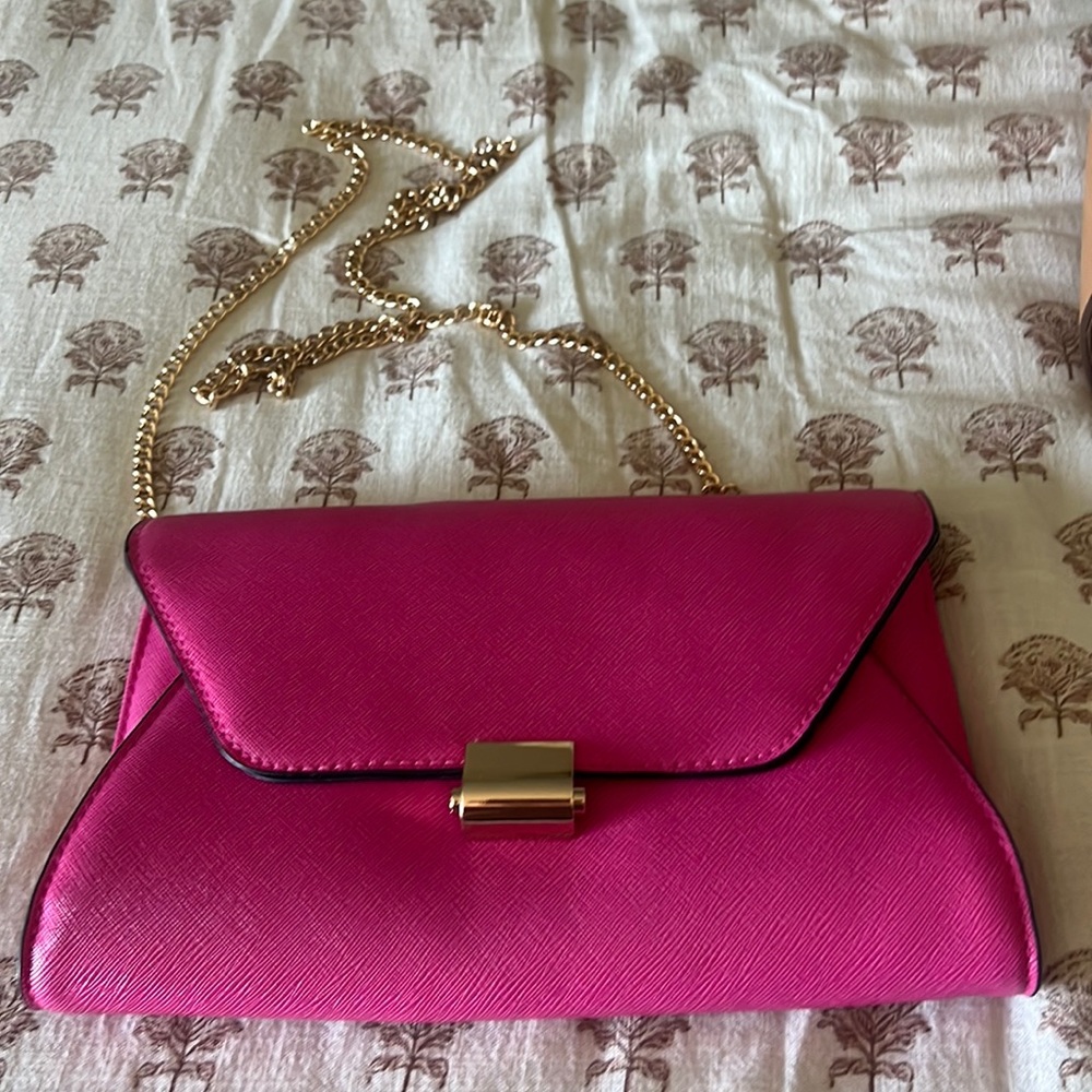 Used once. So pretty! Bright pink!